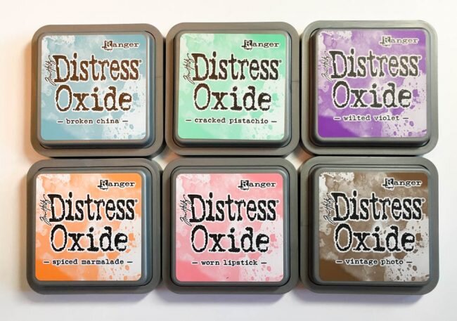 What is the difference between original Distress Ink and Distress Oxide? —  Nally Studios
